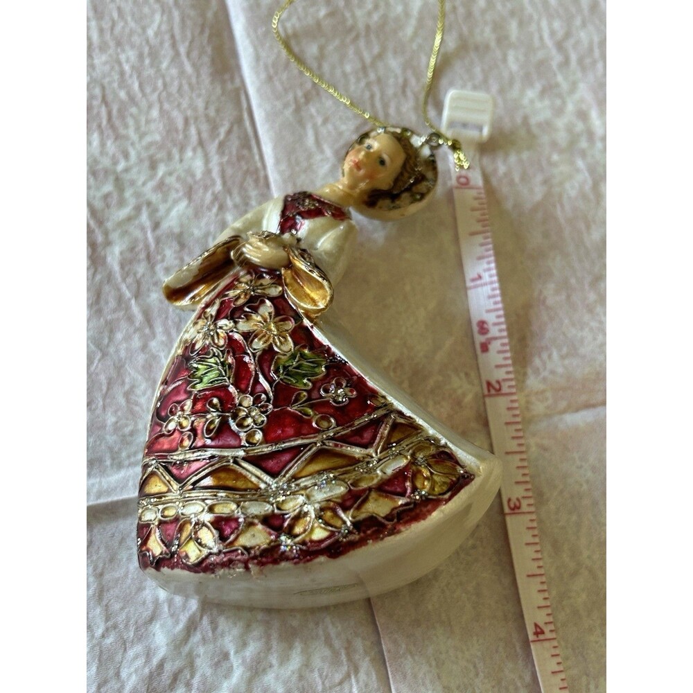 Christmas Ornament Shaped Like a Female Angel with a Colorful Festive Dress